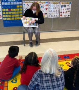 Kathy reading to students