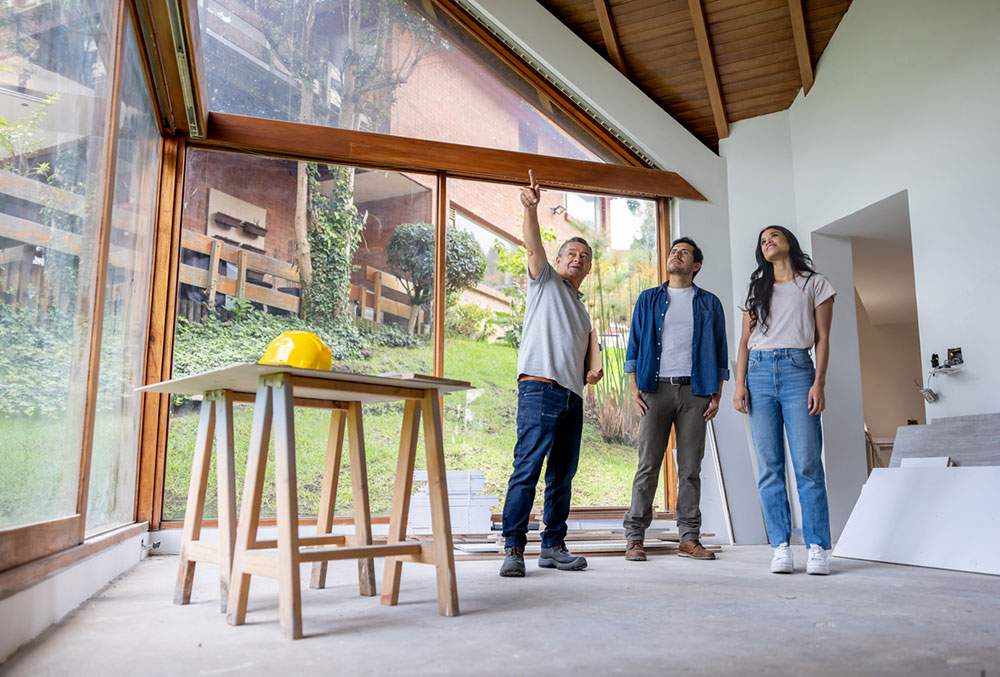 Contractor pointing to design details