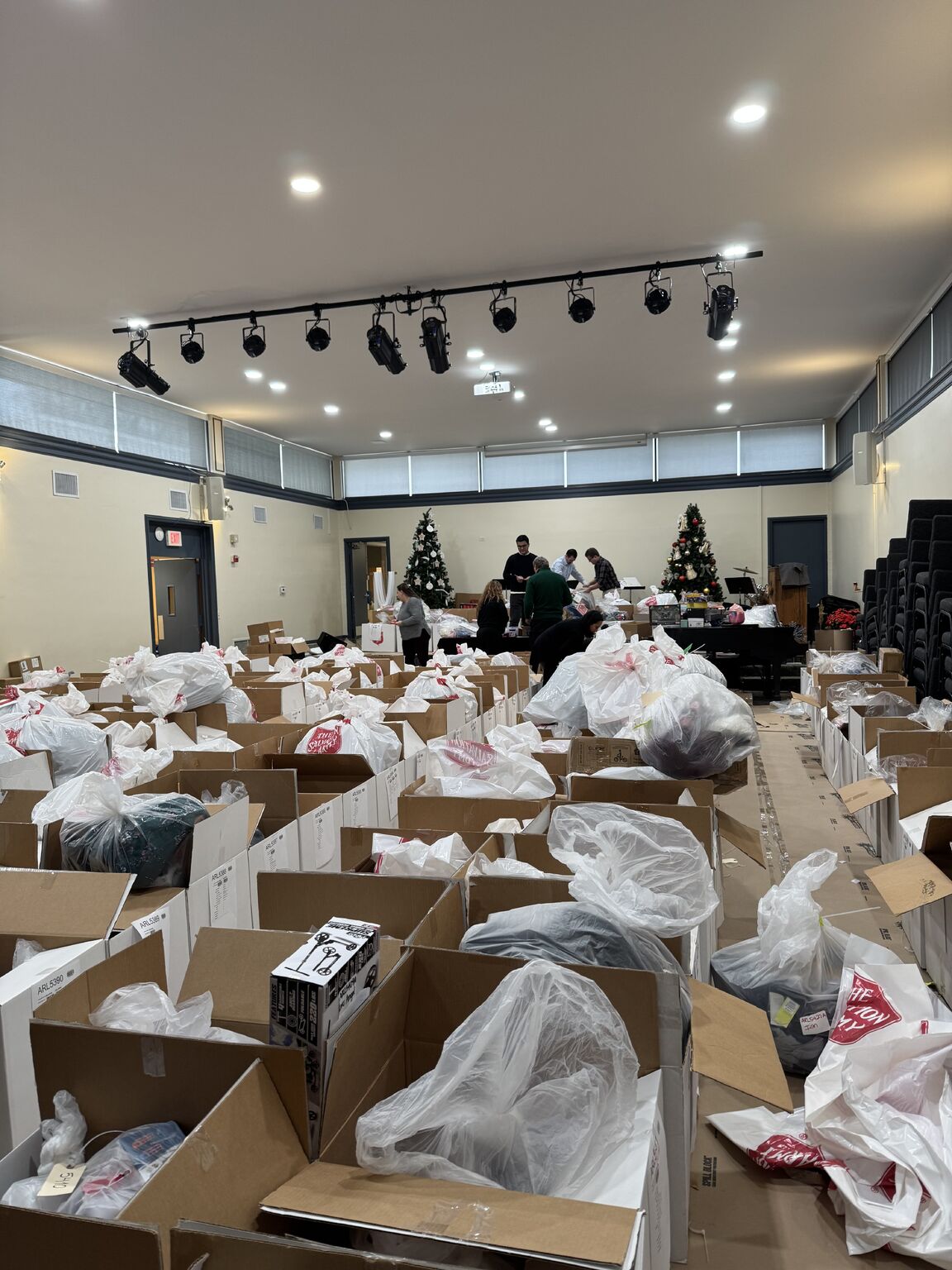 PR-img-12-16-25-salvation-army-4 Packing and organizing gifts at The Salvation Army's Angel Tree program.